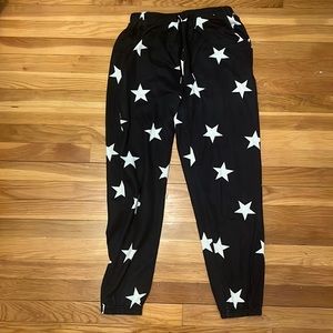 Black sweats and white stars